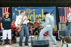 Mike Huckabee with his band, Capitol Steps, and a Fat Elvis impersonator