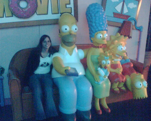 Gretel on the couch with with the Simpsons