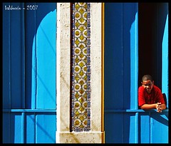 Boy in red over blue duplex door (or something like that) - by Edgardo Balduccio
