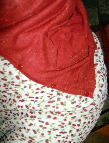 closeup of modern Charlotte Russe sweater and cherry dress