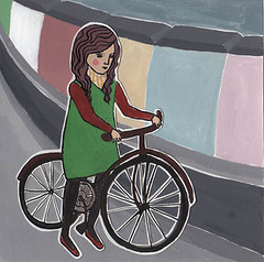Green dress girl likes bike