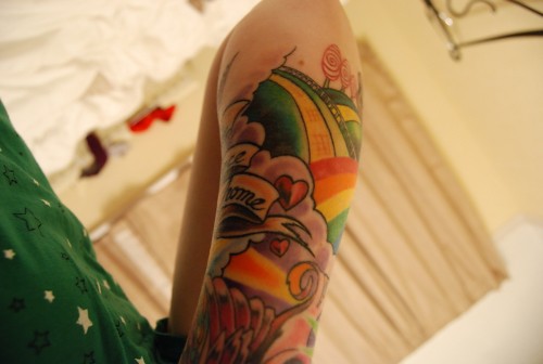 rainbow tattoo. scroll tattoo