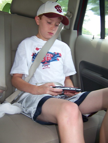 100619 in car 02 - Spencer playing video game