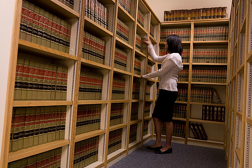 Paralegal at Work. Paralegals spend time in libraries, where they perform 