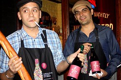 Luis da Silva (left), manager of Jules Bistro on St. Marks, and co-worker show off their selection of Beaujolais Nouveau 2010