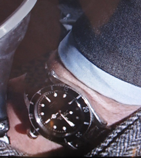 The Rolex ?5?? (6538 probably) has a black band around the winder.