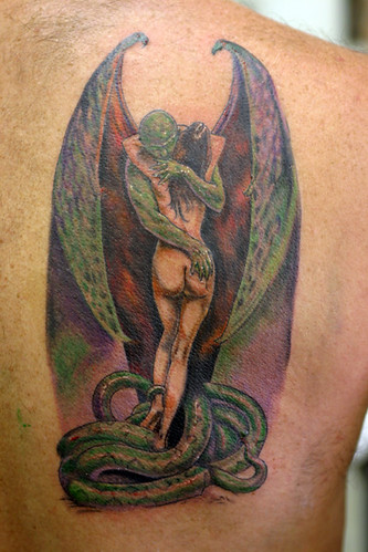 Angel vs She devil devil demon and girl Tattoo by The Tattoo Studio.