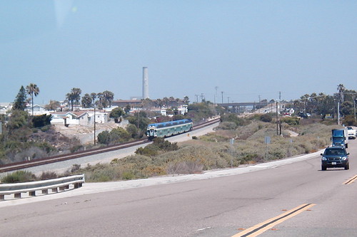 A southbound commuter train approaches Poinsettia station in Carlsbad, California