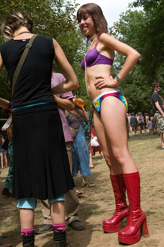 Girl wearing extra-high-heeled red boots and bikini at Oregon Country Fair 2007