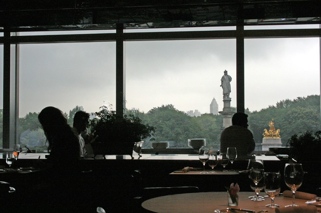 Silhouettes of a female diner and chefs