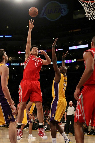 Oct. 26th, 2010 - Yao Ming shoots a jump hook over the LA Lakers' Lamar Odom
