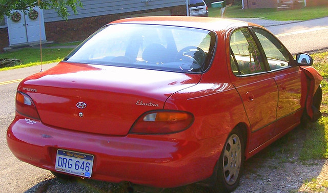 red broken car geotagged automobile 1997 damaged hyundai elantra rcvernors nowheel whathappenswhenyoudonttightenlugnuts