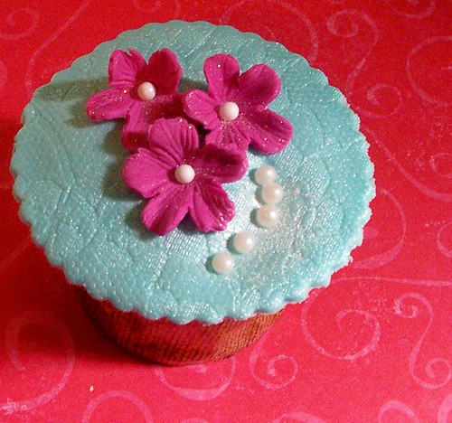 I love pink and teal blue together The flowers we made with a veining tool