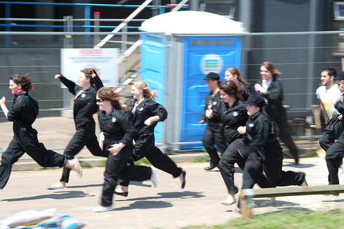 Scary people in black boiler suits.