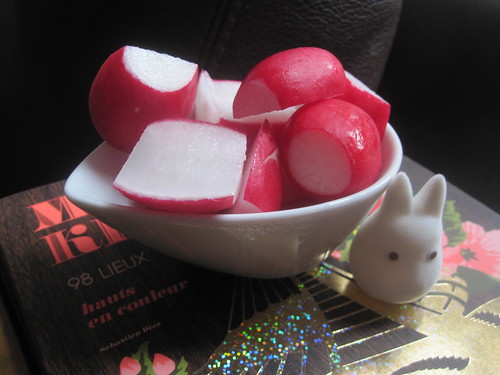 Radishes with small white Totoro friend