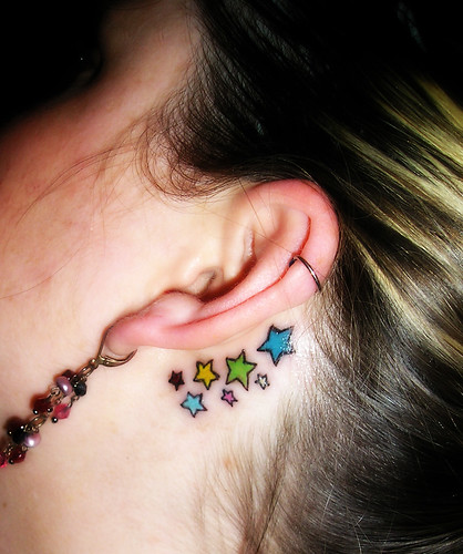 Stars Tattoo On Lower Ear Girl
