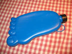 Foot-shaped hot water bottle with toenails