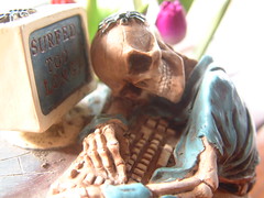 skeleton at desk