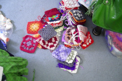 various granny squares on the floor