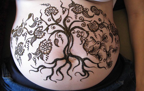 pregnant belly. pregnant belly henna tree