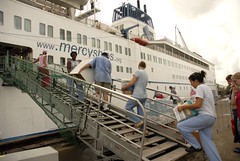 Going up the gangway to the Africa Mercy with Boxes during Transition