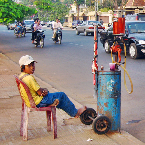 Barefoot buy selling gas in Penhom Pehn, Cambodia.