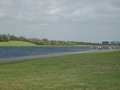 Runners next to the lake to the right
