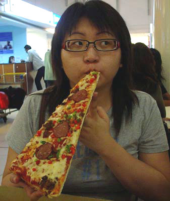Suanie eating NY Pizza