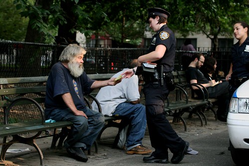 Carl is given a ticket and told to leave the park