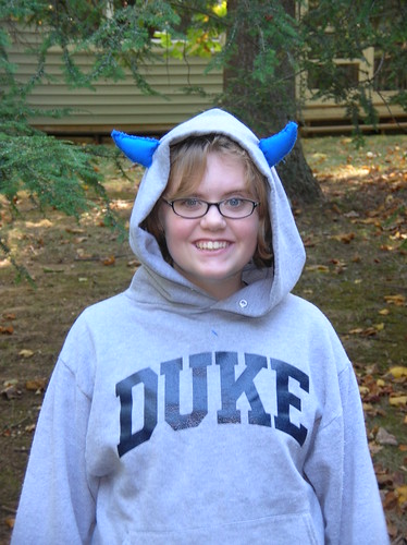 Blue Devil With A Grey Hoodie On