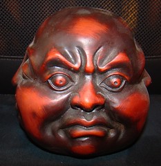 angry buddha sculpture