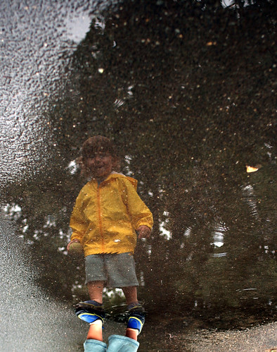 Boy in a puddle