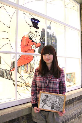 Chikako with her window art with QOS lapel Cardigan