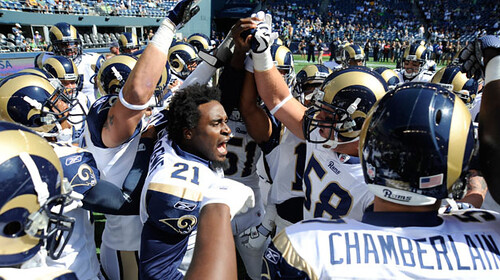 Atogwe fires up the pre-game huddle. Photo from stlouisrams.com