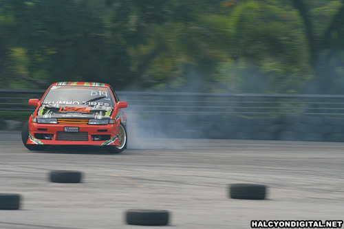 A competition car drifts sideways during the Bukit Jalil Drift Attack held