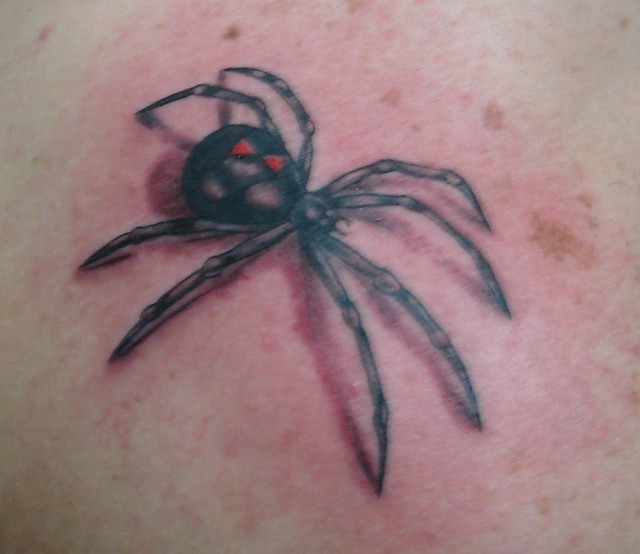 spider tattoo. a black widow on my shoulder. captured by: Aline Menezes