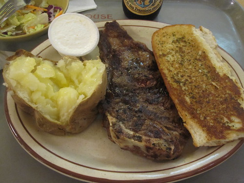 Salad, bread (uneaten), steak, baked potato with butter and sour cream at Tad's Steak House - $19.80 including one beer