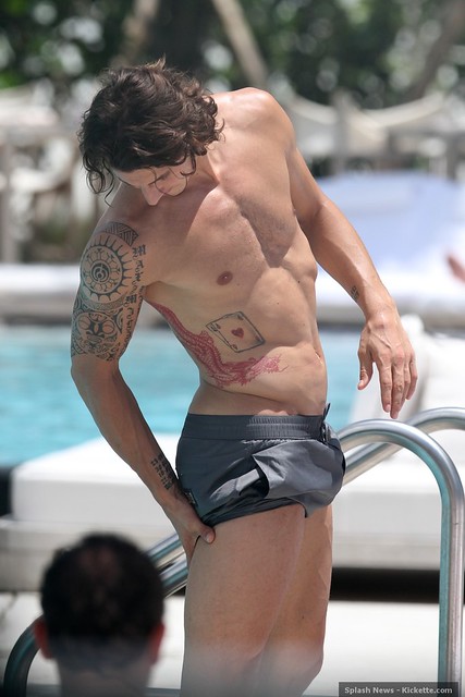 Barcelona forward Zlatan Ibrahimovic shirtless poolside in Miami Beach, FL.