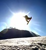 A snowboarder in flight in Missouri.
