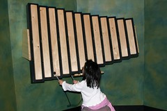 Olivia playing a xylophone