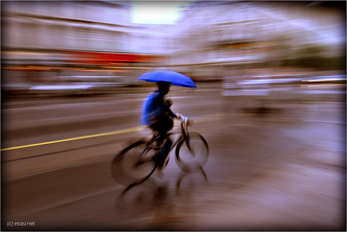 cykling with an umbrella