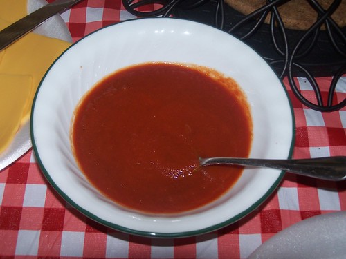 Bowl of spaghtetti sauce, with spoon