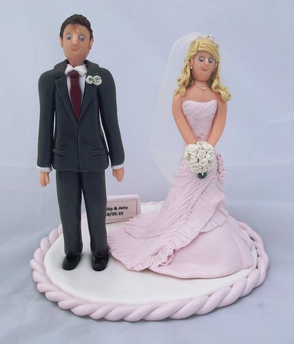 These wedding cake toppers were handcrafted with no molds or paint used and