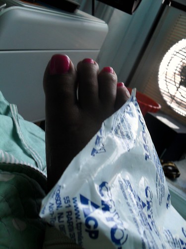 sprain with pink pedicure
