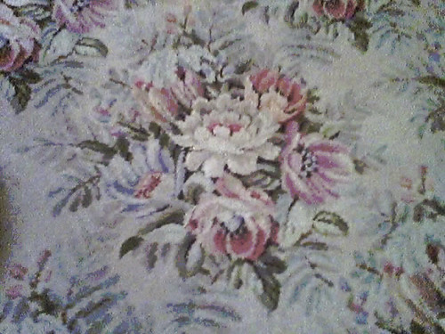 antique rug floral closeup