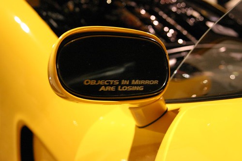 Objects in mirror are losing Corvette