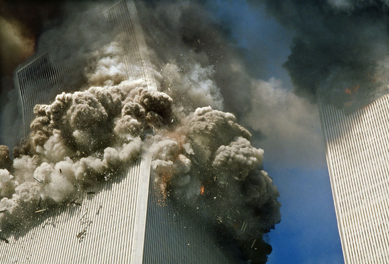 [Image: The South Tower of the World Trade Center on 9/11;