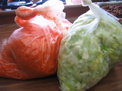 Sliced carrots and celery in plastic bags