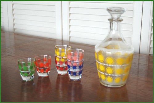 french decanter and shot glasses