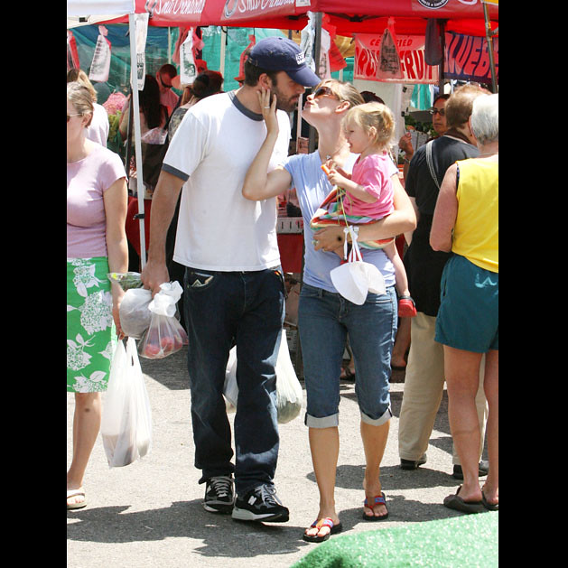 Ben Affleck steals a kiss from wife Jennifer Garner during a family outing to the farmer's market in Brentwood by HOLLYWOOD KIDS